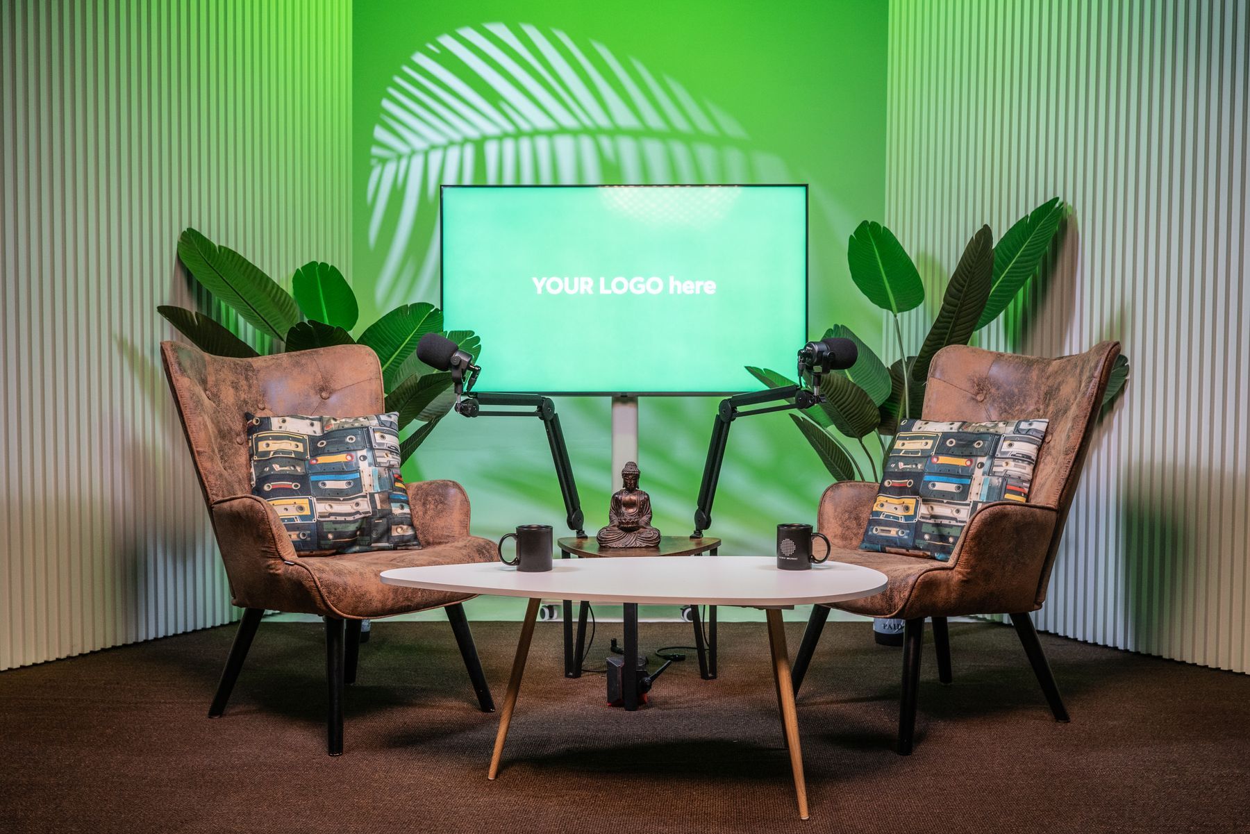 The same podcast interview set lit in green, one of the brand colors available at KSM Podcast Studio Miami